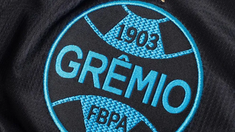 portaldogremista.com_.br-gremio-pode-ter-nike-qual-o-valor-das-camisas-de-futebol-escudo-gremio-preto.png